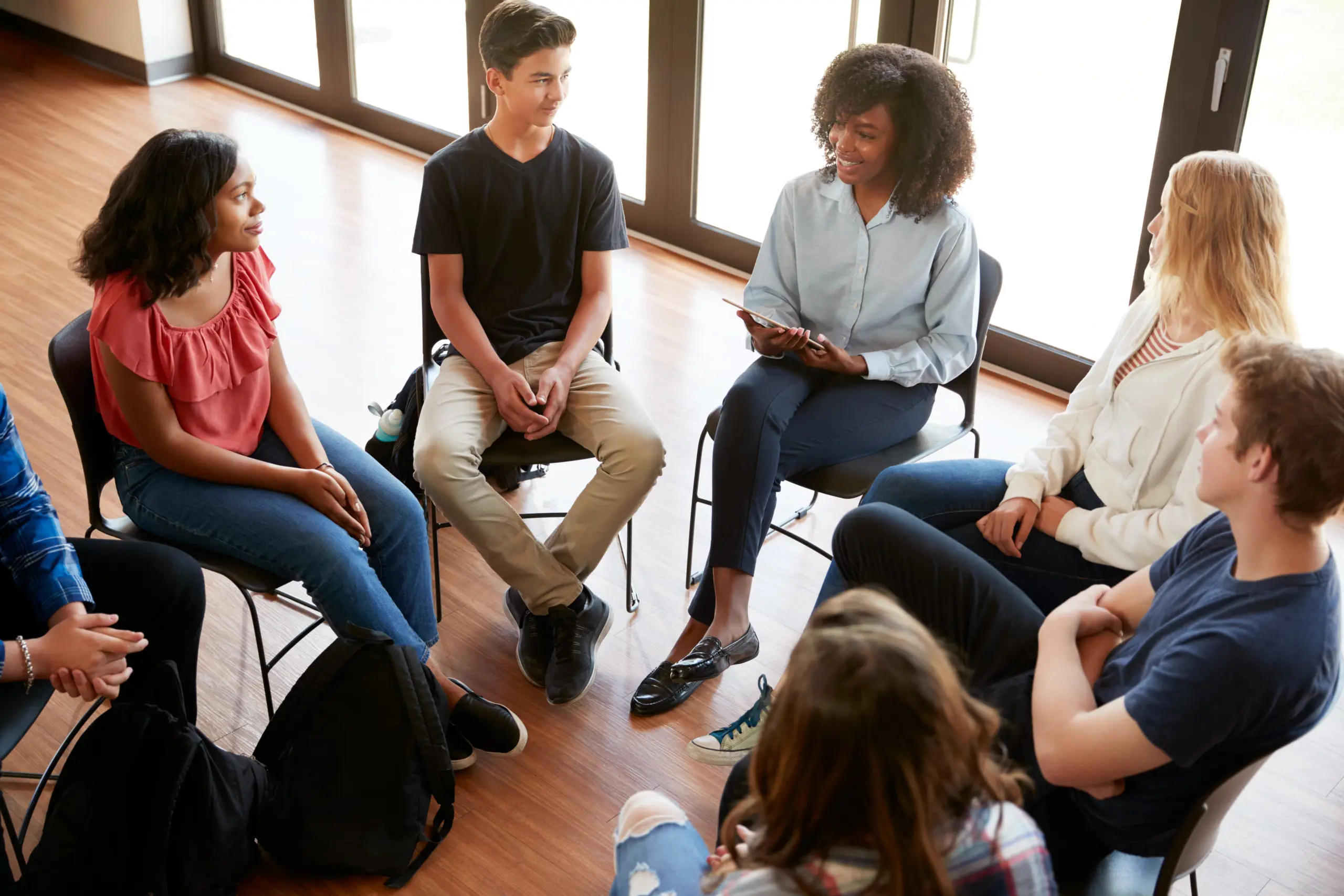 Group therapy session designed to boost your mental health in 2025