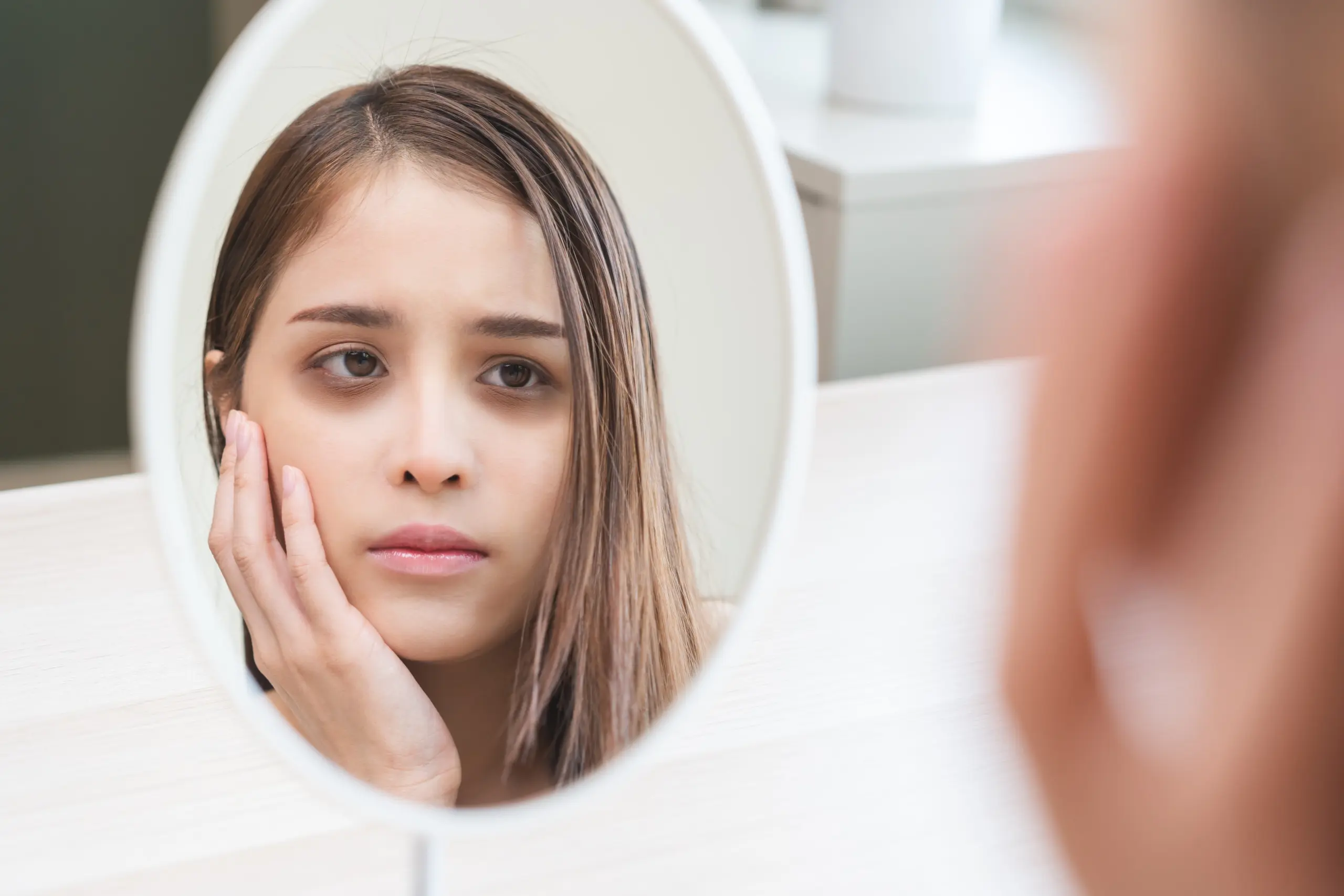 Signs of addiction shown through reflective moment indicating self-awareness