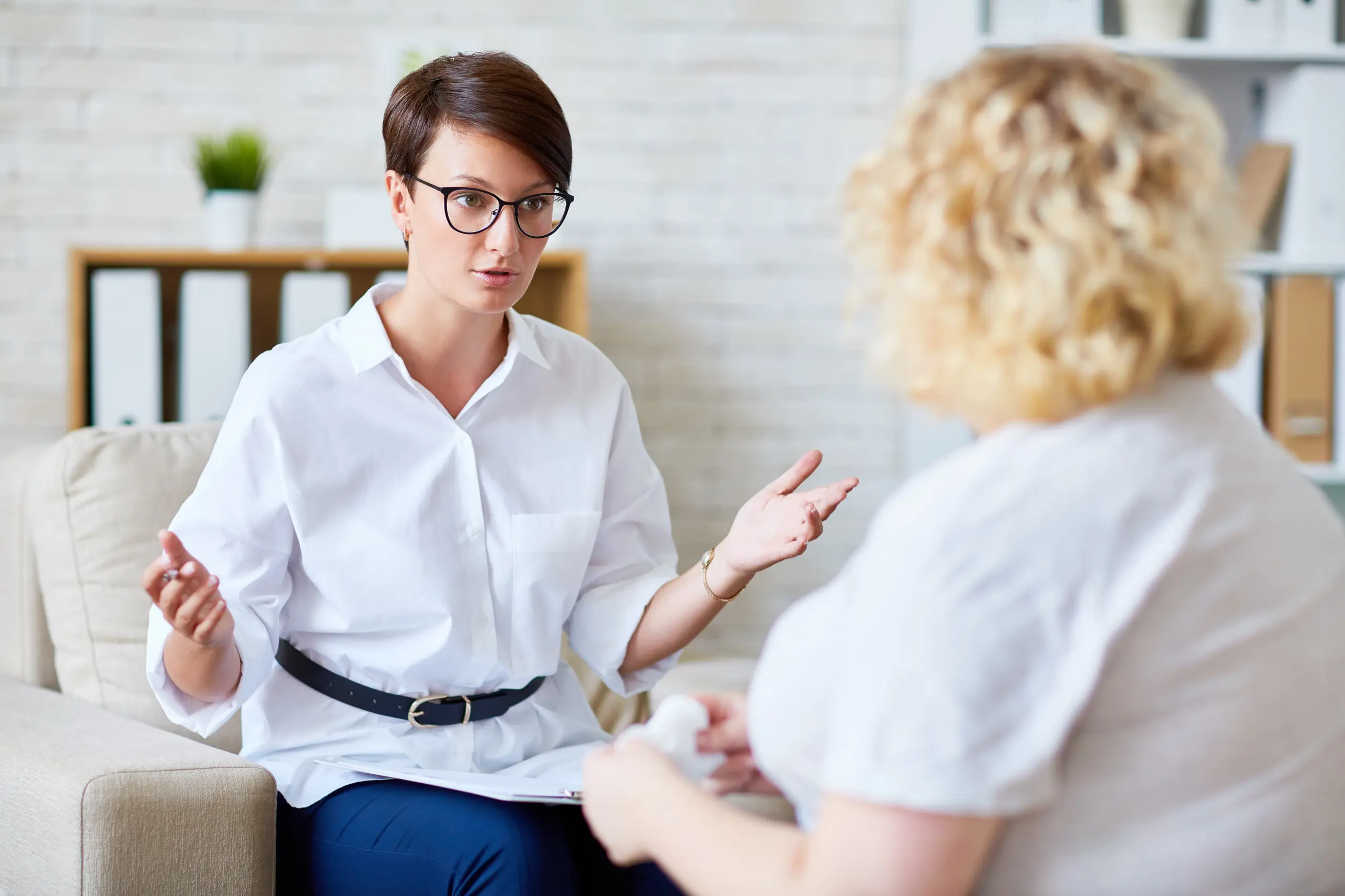 Trauma-informed care session showing support for substance abuse recovery