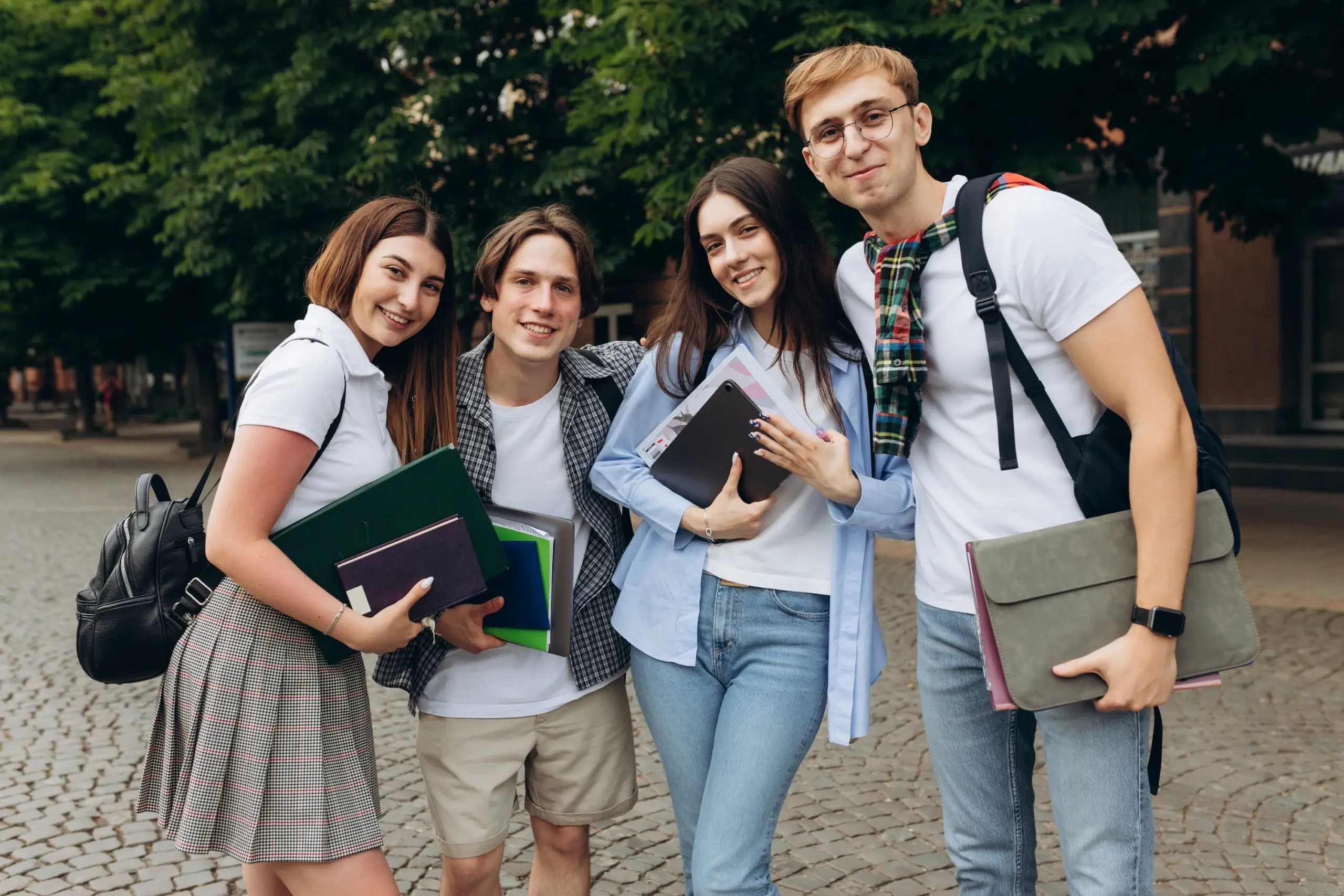 Diverse students in a campus setting, representing a collegiate recovery program or sober student support.